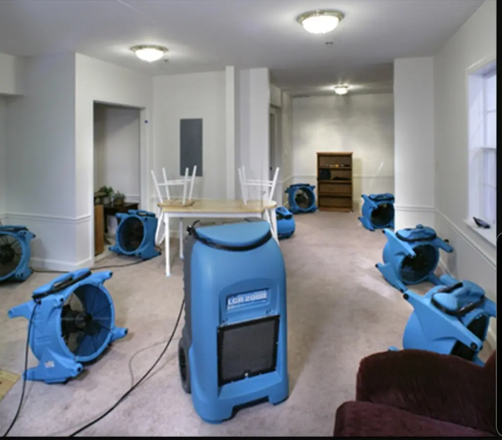 Air movers and dehumidifier setup for Water Extraction & Removal in Logan